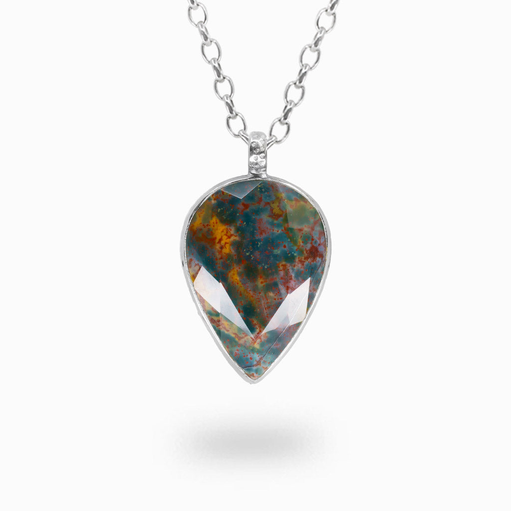 Faceted teardrop Bloodstone pendant necklace in sterling silver with natural green and red coloration.