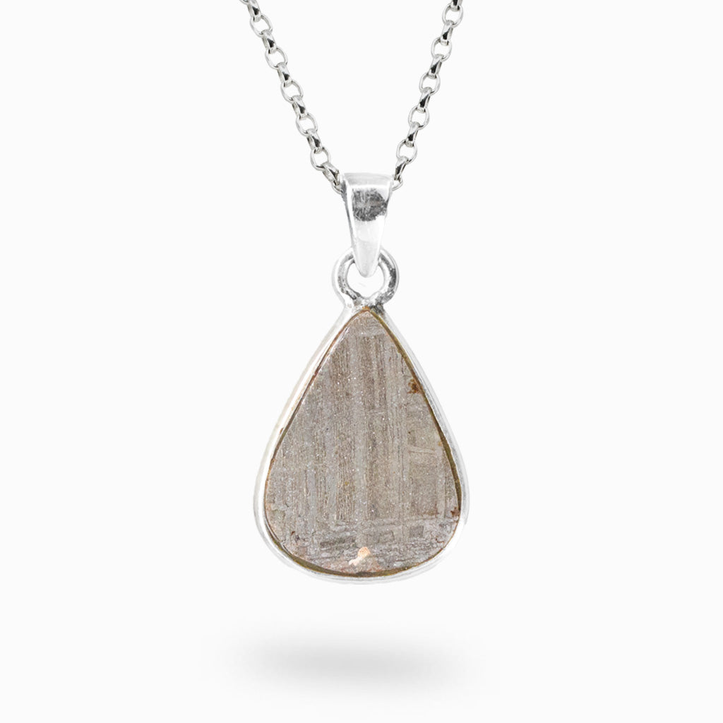 Teardrop-shaped GIBEON METEROITE pendant necklace on a white background