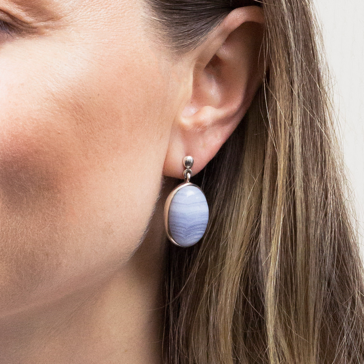 BLUE LACE AGATE CAB STUD DROP EARRINGS ON MODEL