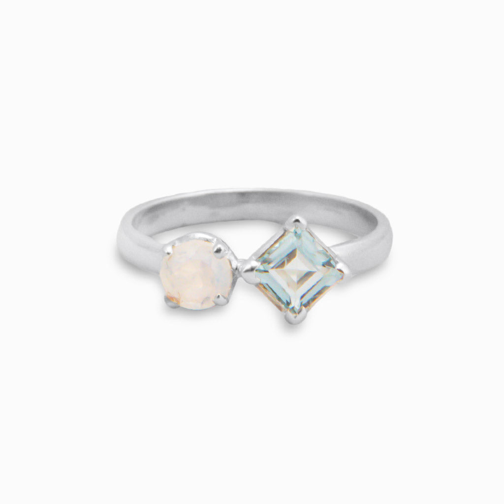 FACETED BLUE TOPAZ AND RAINBOW MOONSTONE RING