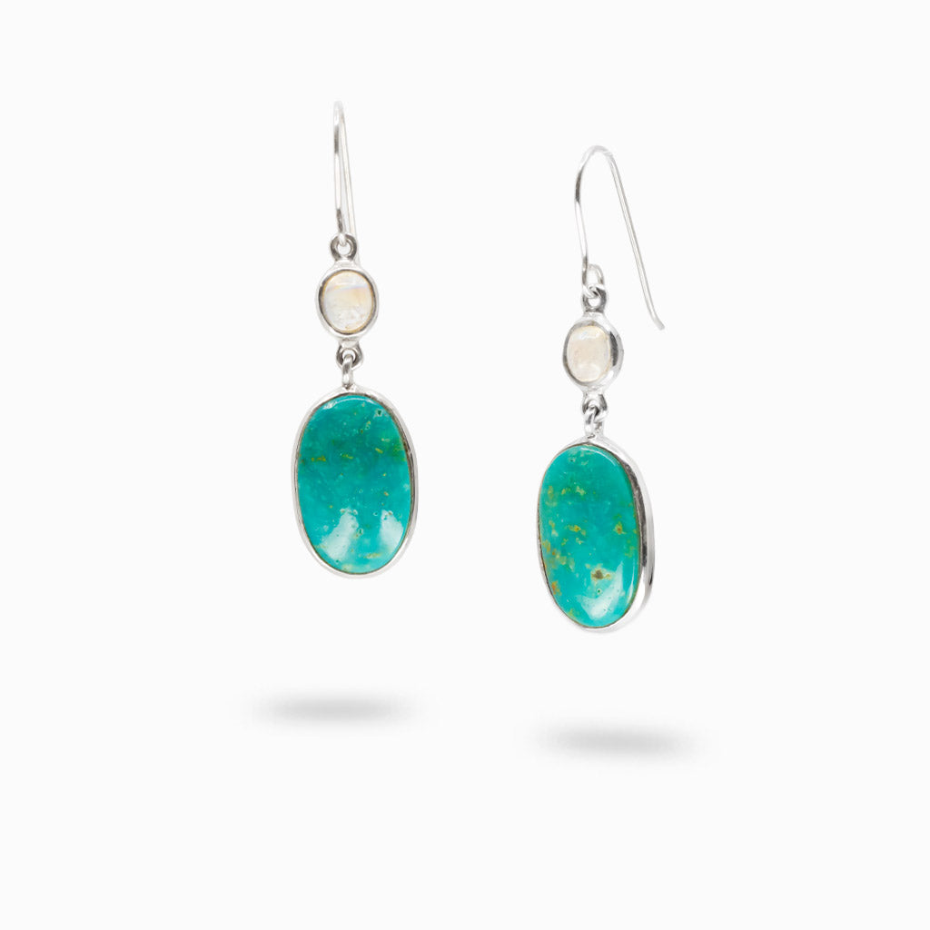 Campo Frio Turquoise oval cabochon earrings with round Rainbow Moonstone accents in sterling silver.