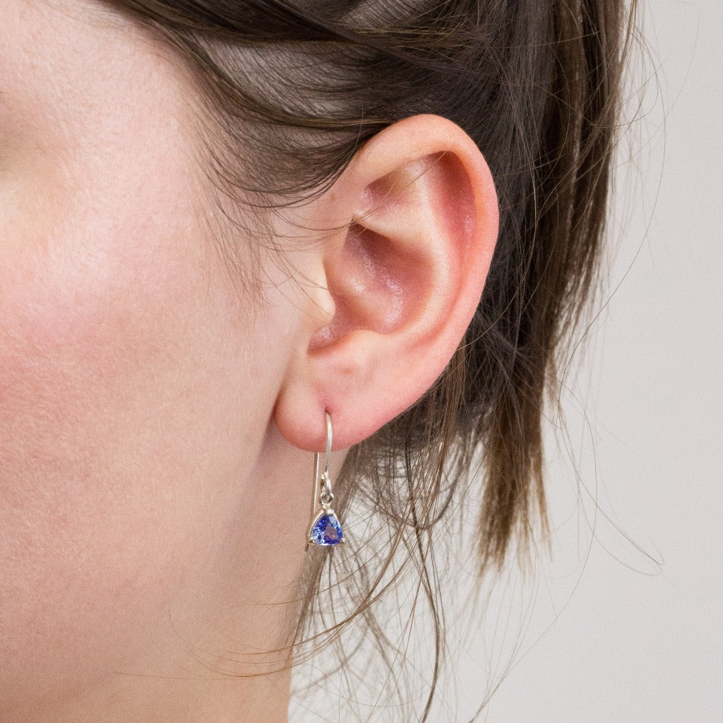 Tanzanite drop earrings on model