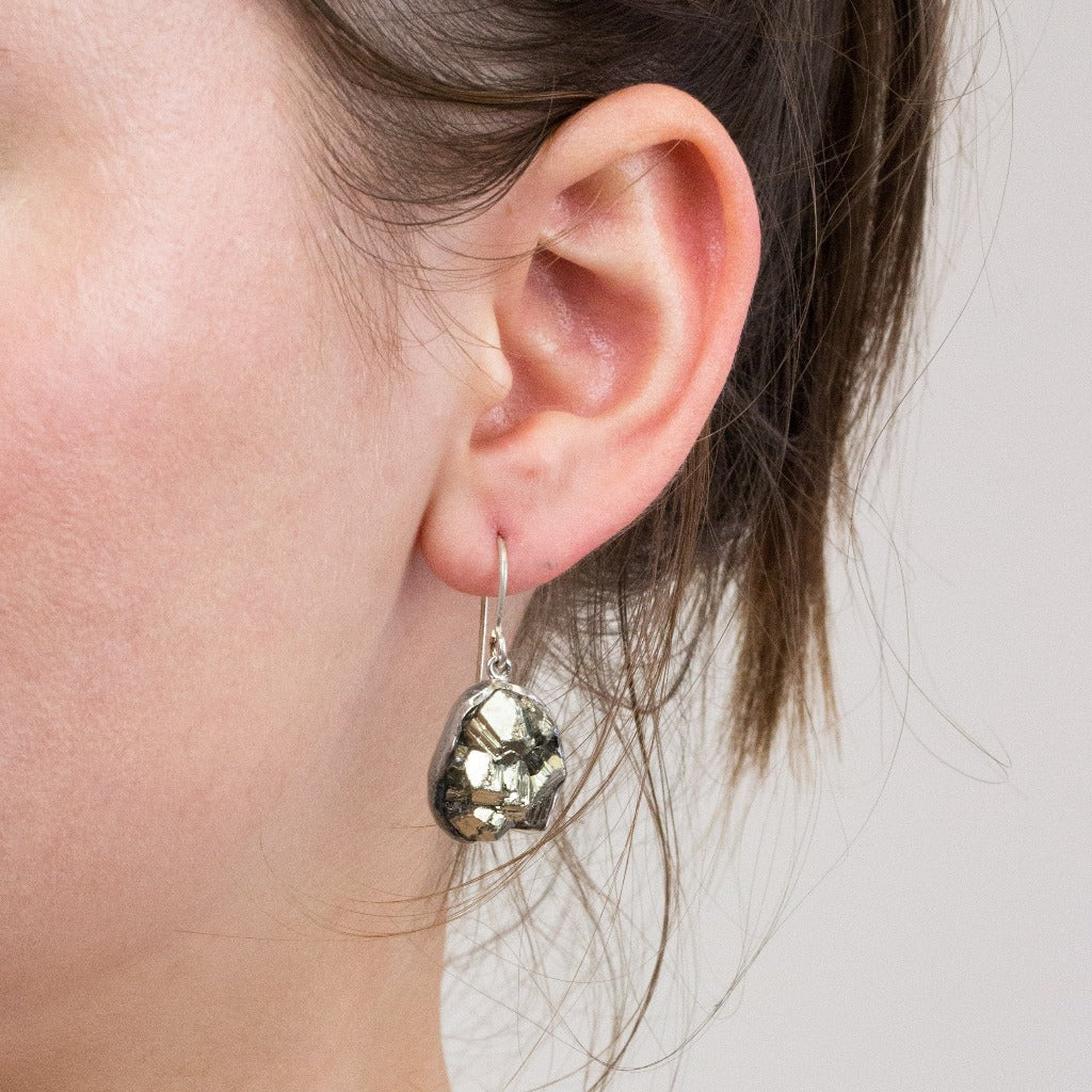 Pyrite drop earrings on model