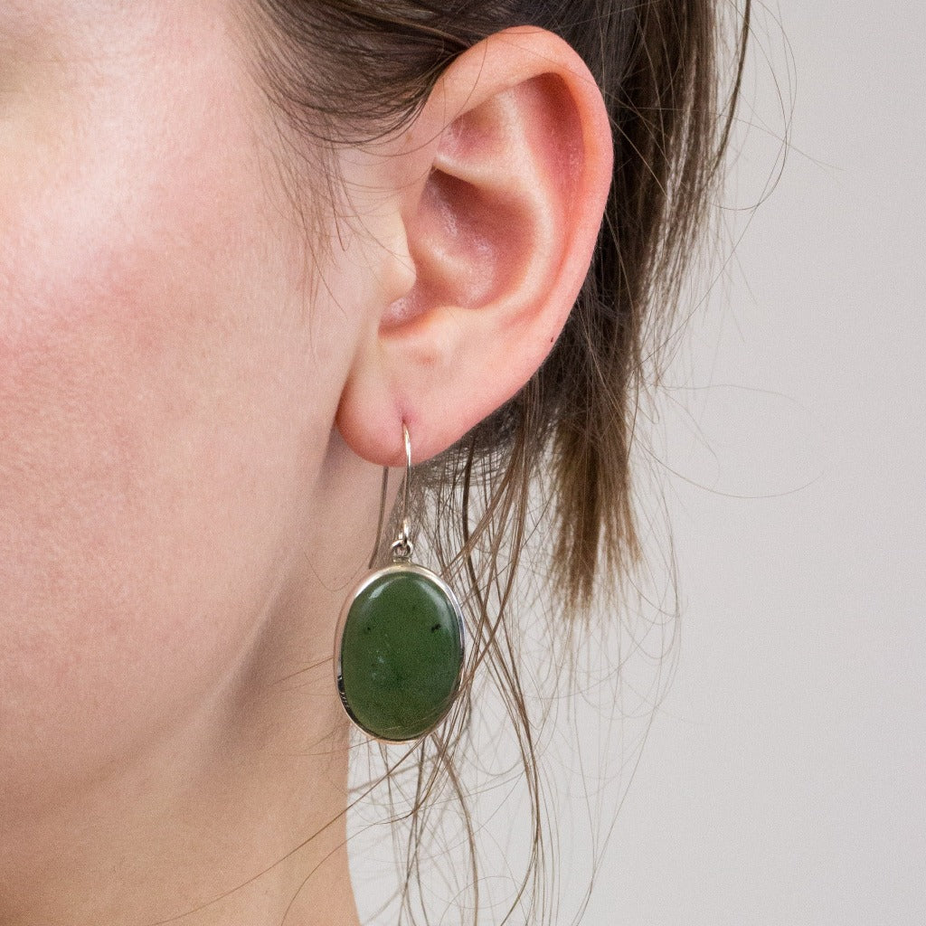 Jade drop earrings on model