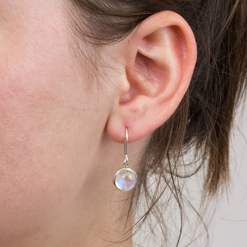 Rainbow Moonstone drop earrings on model
