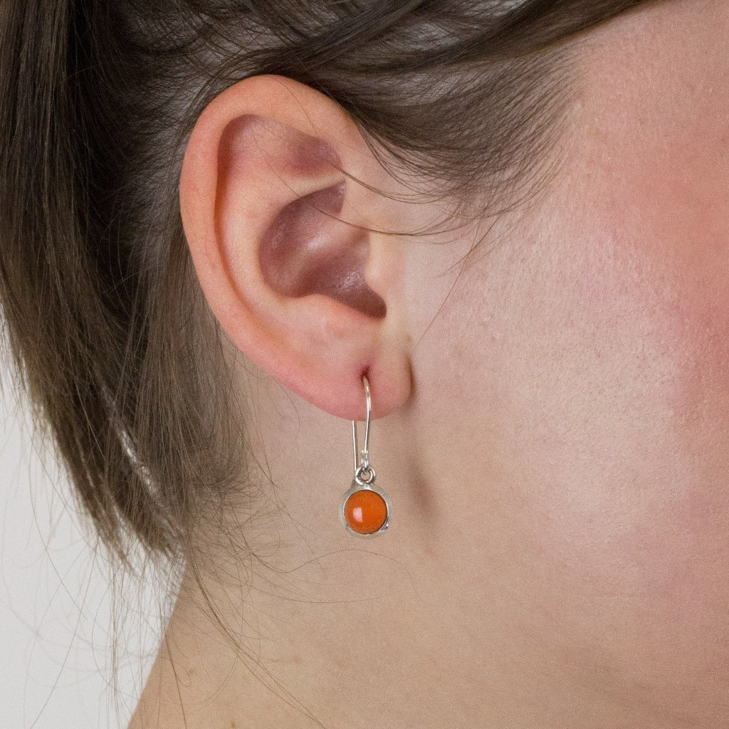 Carnelian drop earrings on model