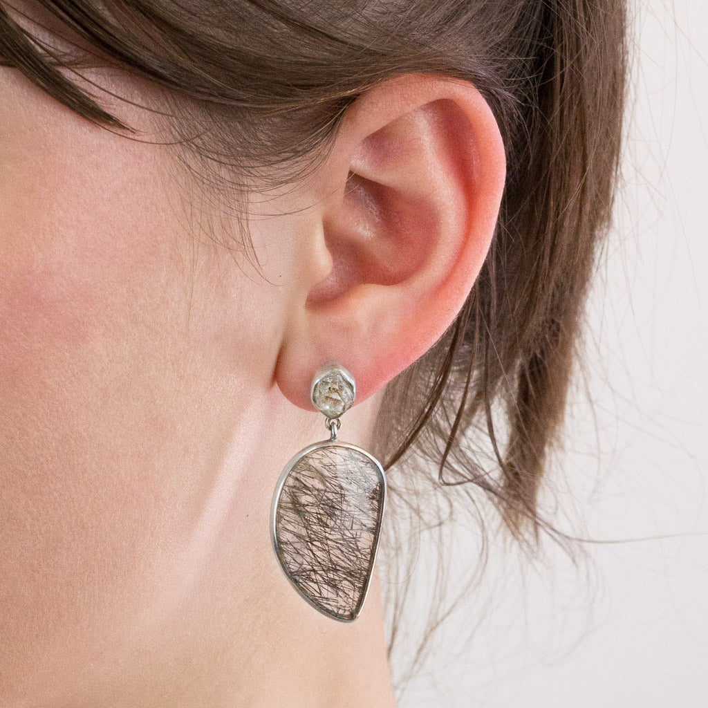 Herkimer Diamond and Tourmalinated Quartz stud drop earrings on model