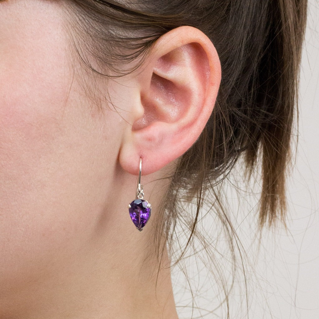 Amethyst drop earrings on model