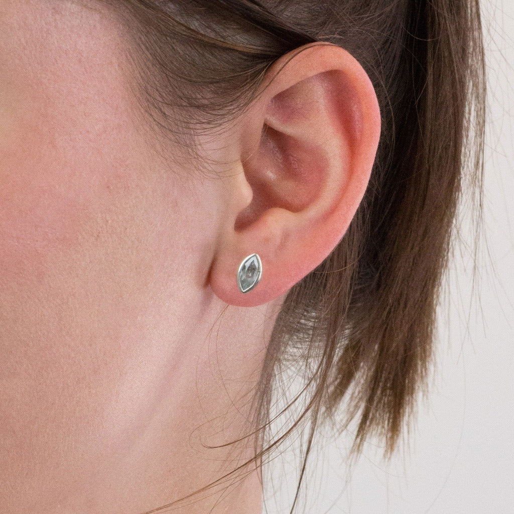 Aquamarine stud earrings on model