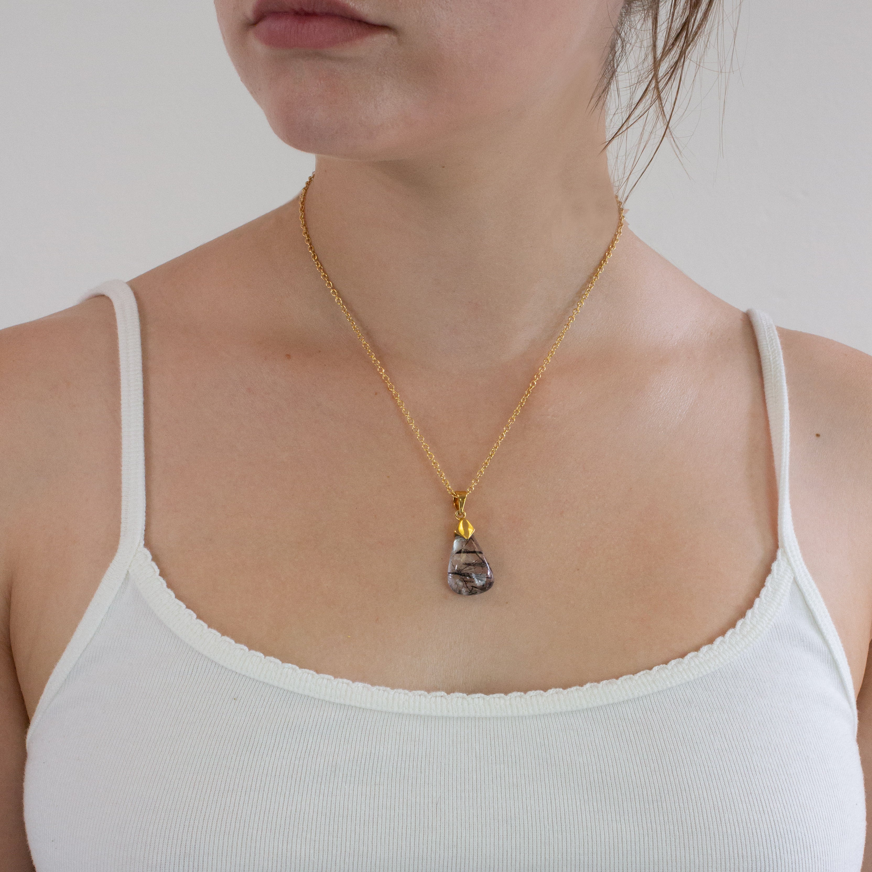 Tourmalinated Quartz necklace on model