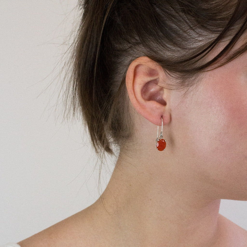 Citrine drop earrings on model