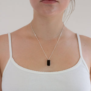 Moldavite necklace on model