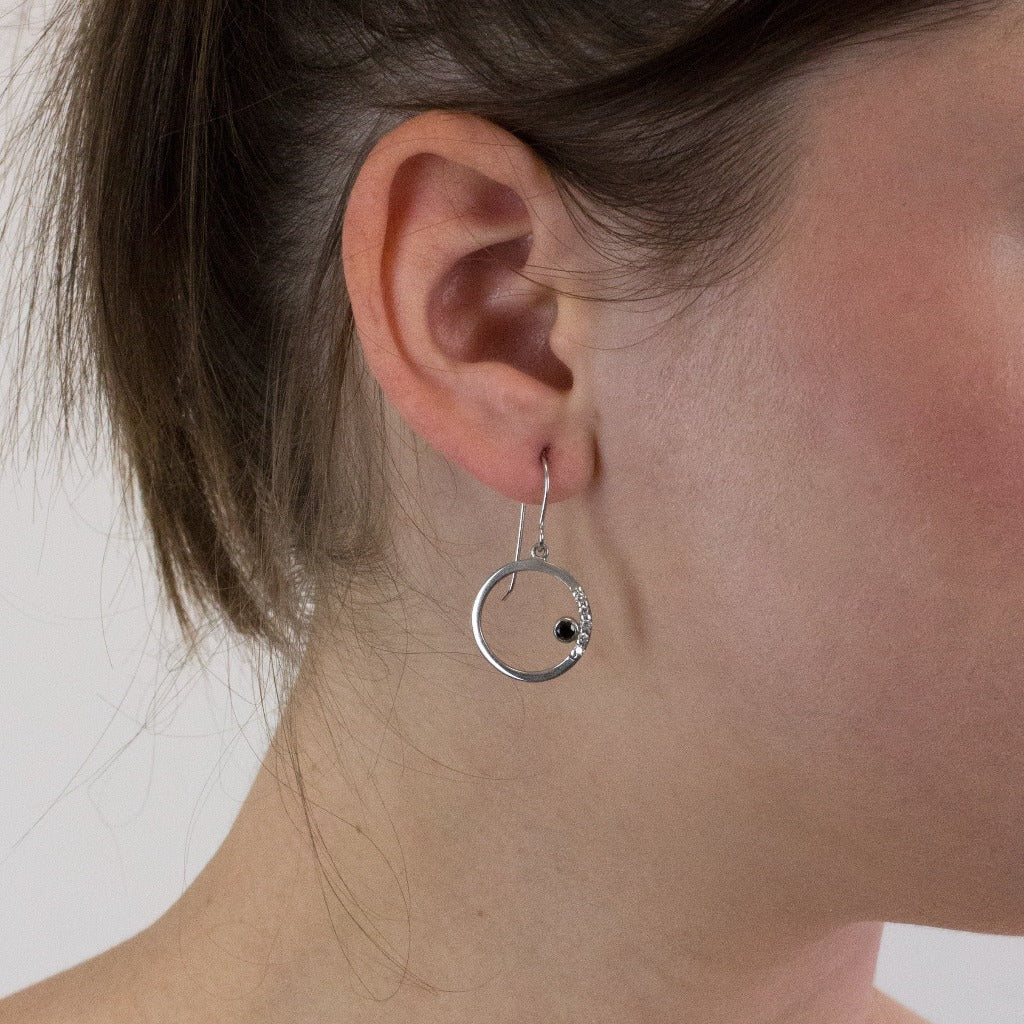 Spinel drop earrings on model