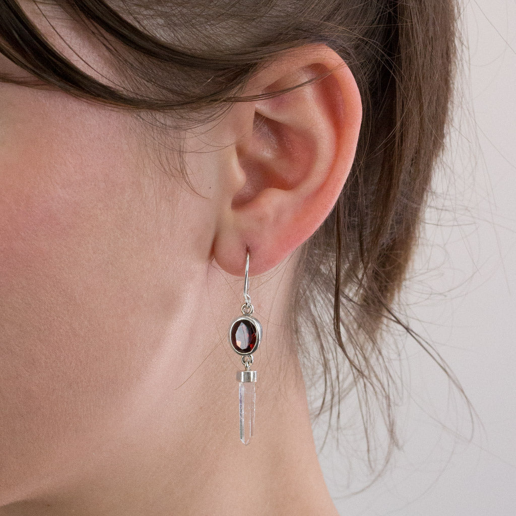 Garnet and Laser Quartz drop earrings on model