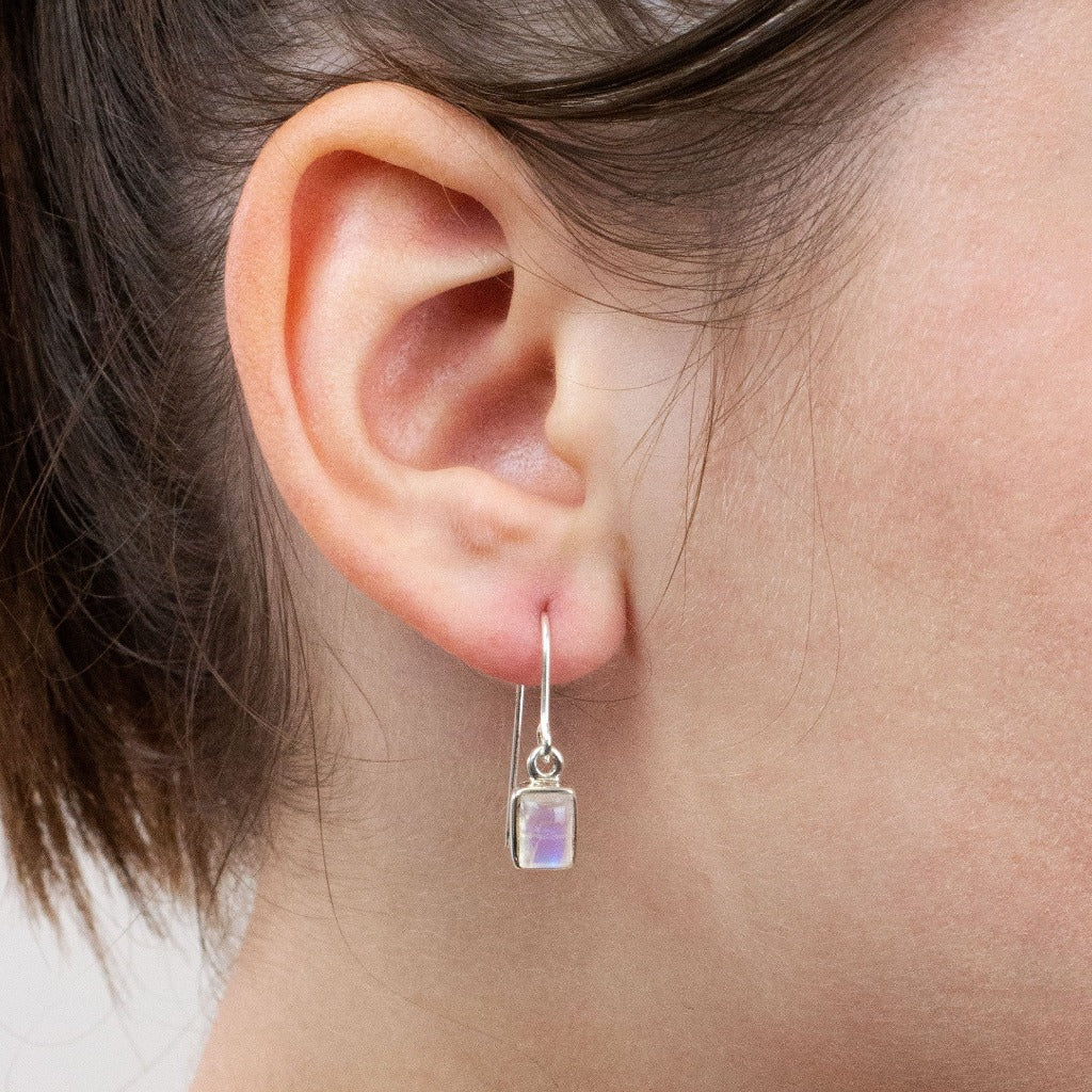 Rainbow moonstone drop earrings on model