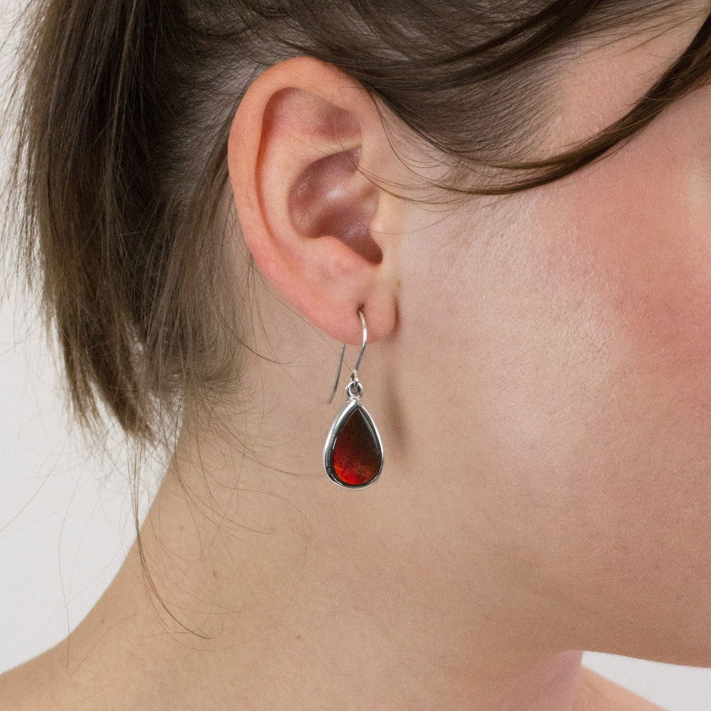 Ammolite drop earrings on model