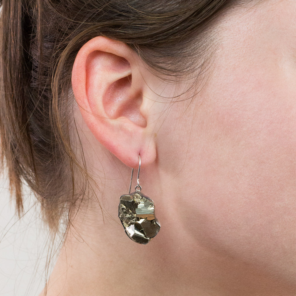 Pyrite drop earrings on model