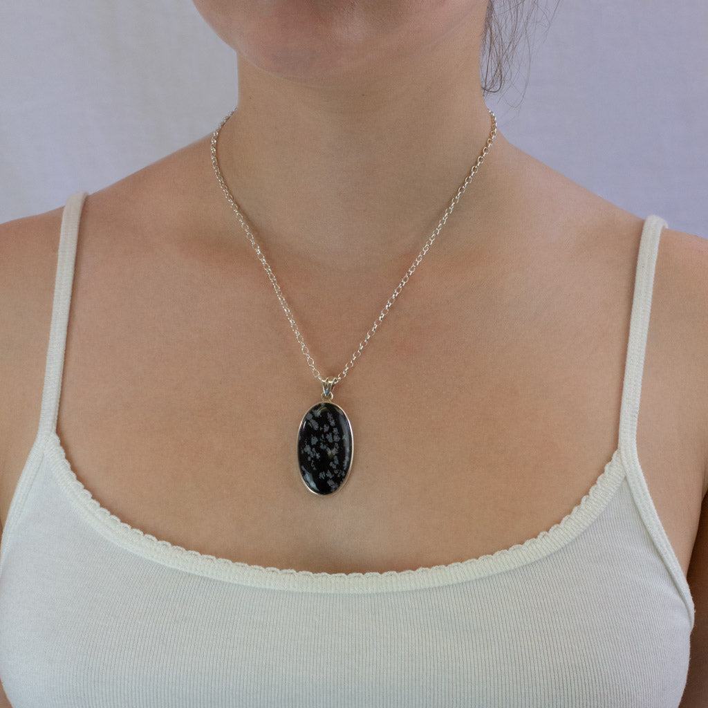 Snowflake Obsidian necklace on model