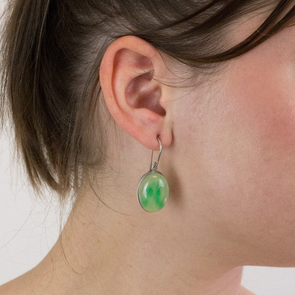 Jadeite drop earrings on model