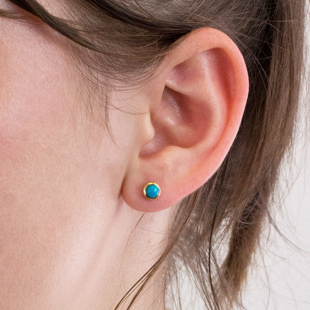 Sleeping Beauty Turquoise stud earrings on model