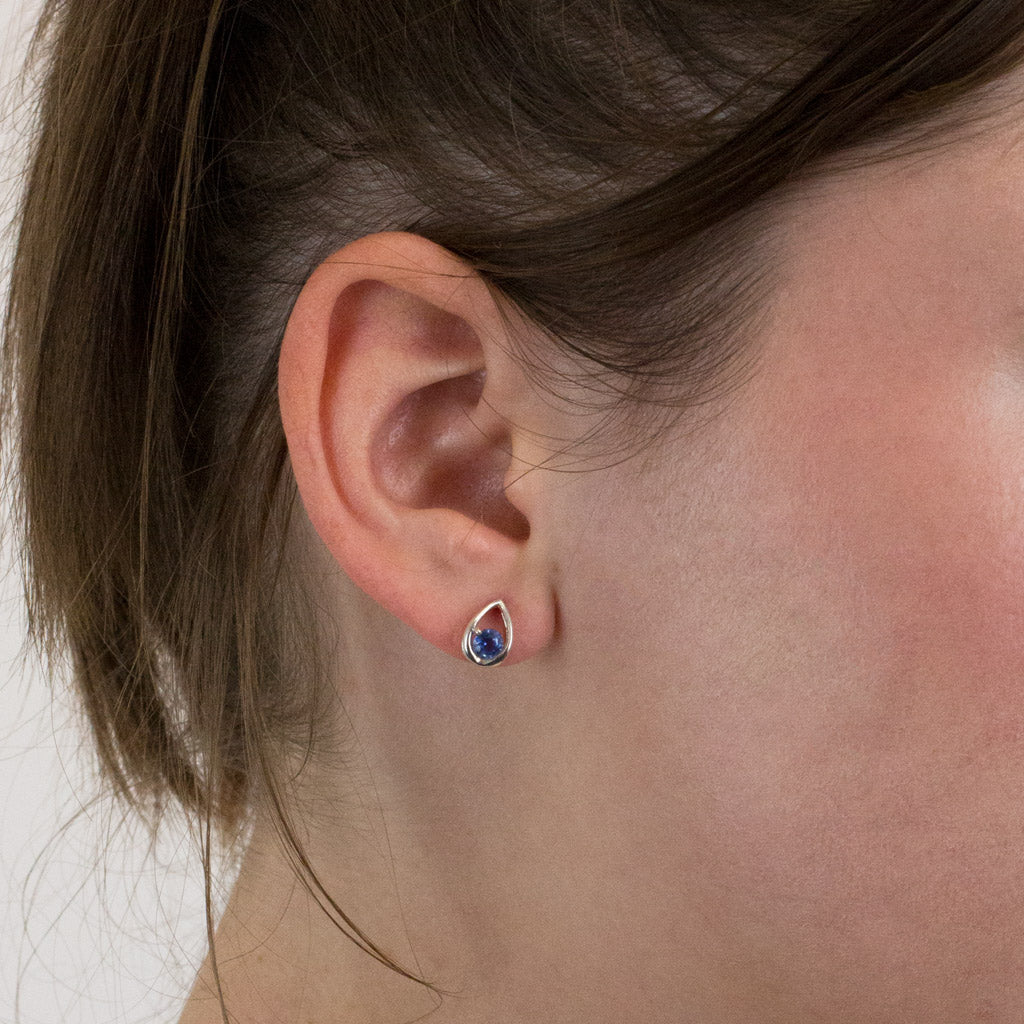Kyanite stud earrings on model