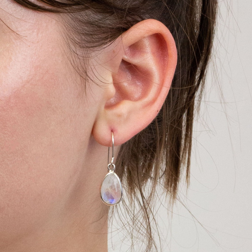 Rainbow Moonstone drop earrings on model