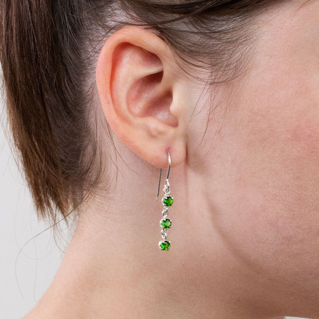 Chrome Diopside drop earrings on model