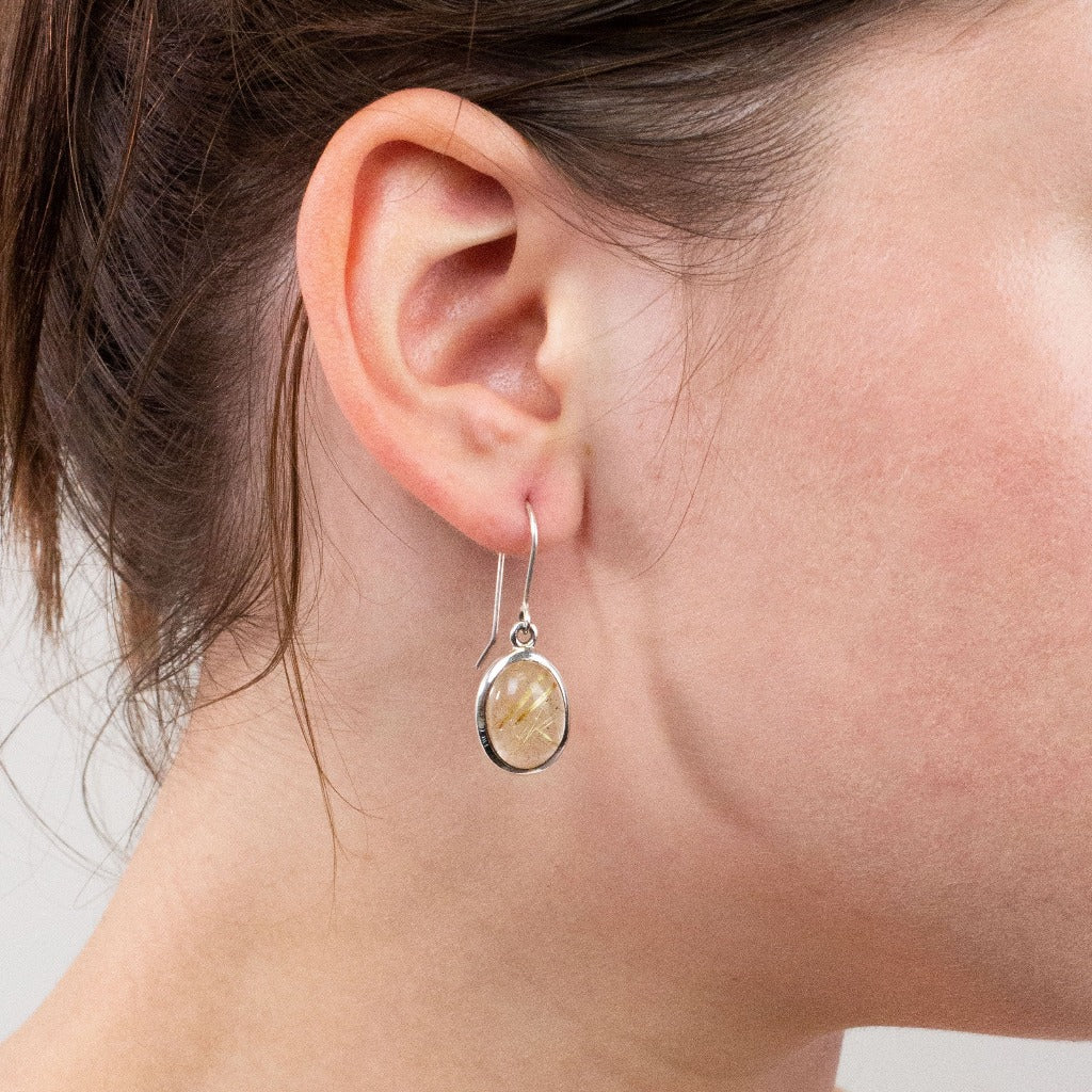 Rutilated Quartz drop earrings on model