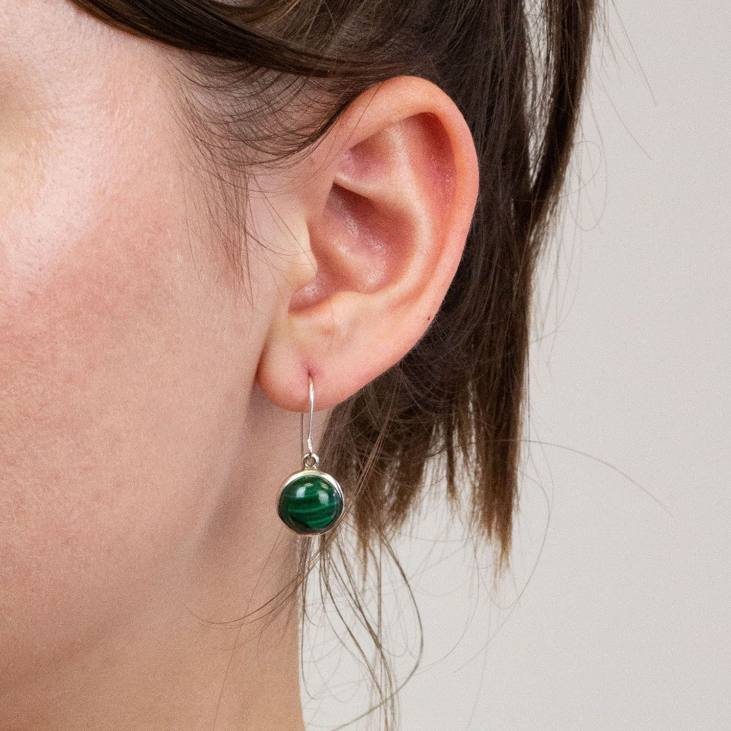 Malachite drop earrings on model
