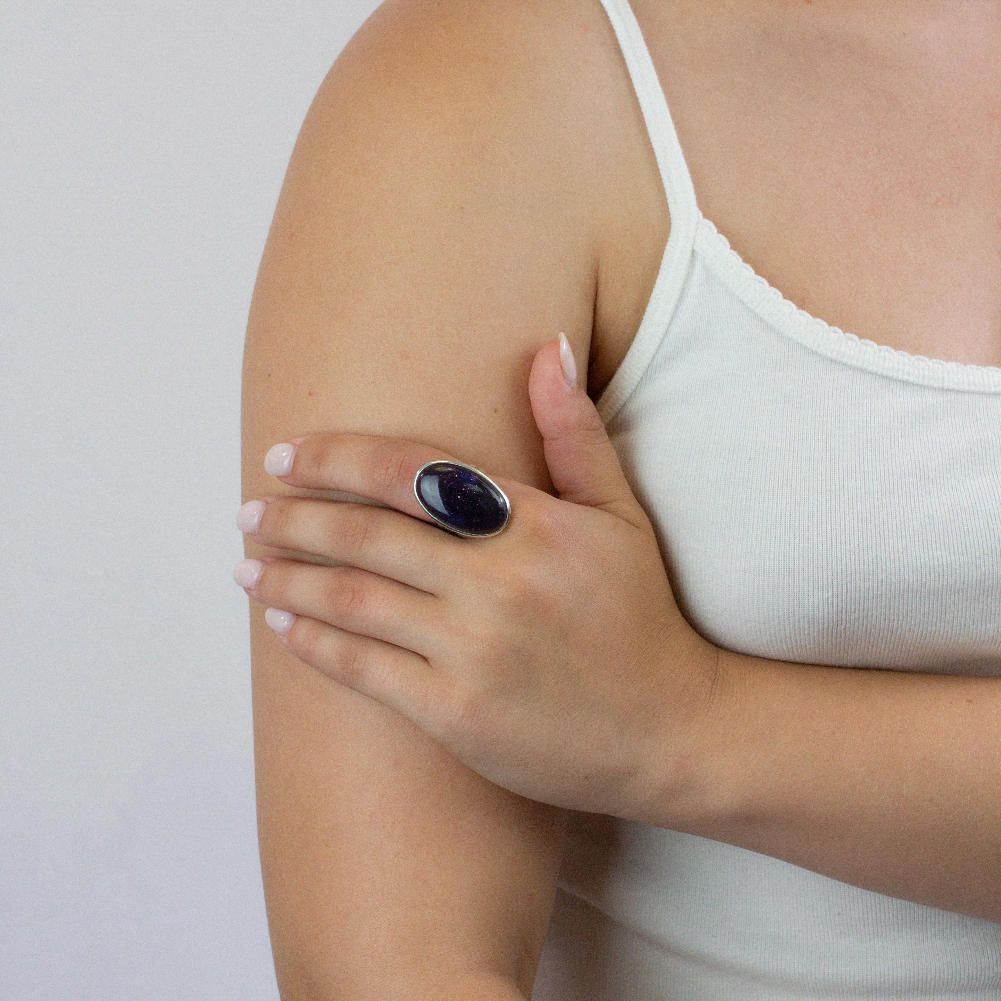 Oval Cabochon Iolite ring on model