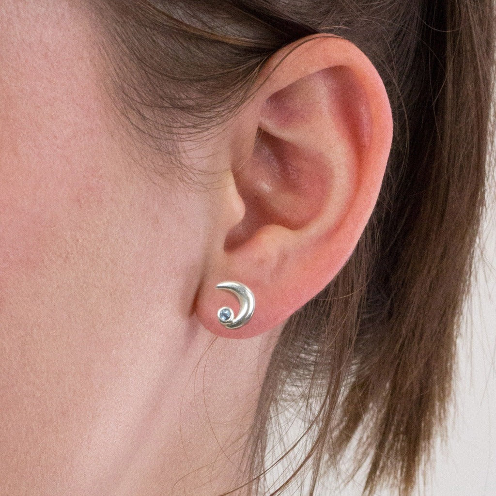 Blue Topaz stud earrings on model