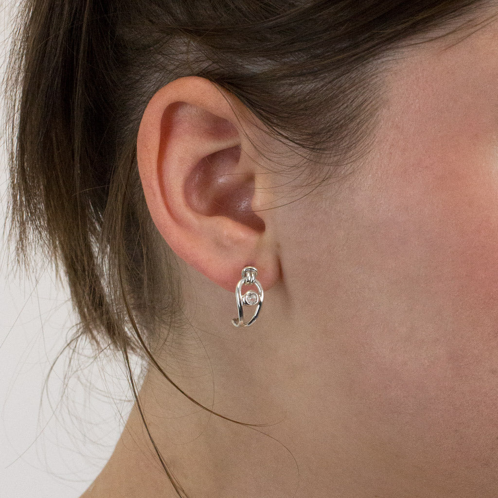 Clear Quartz stud earrings on model