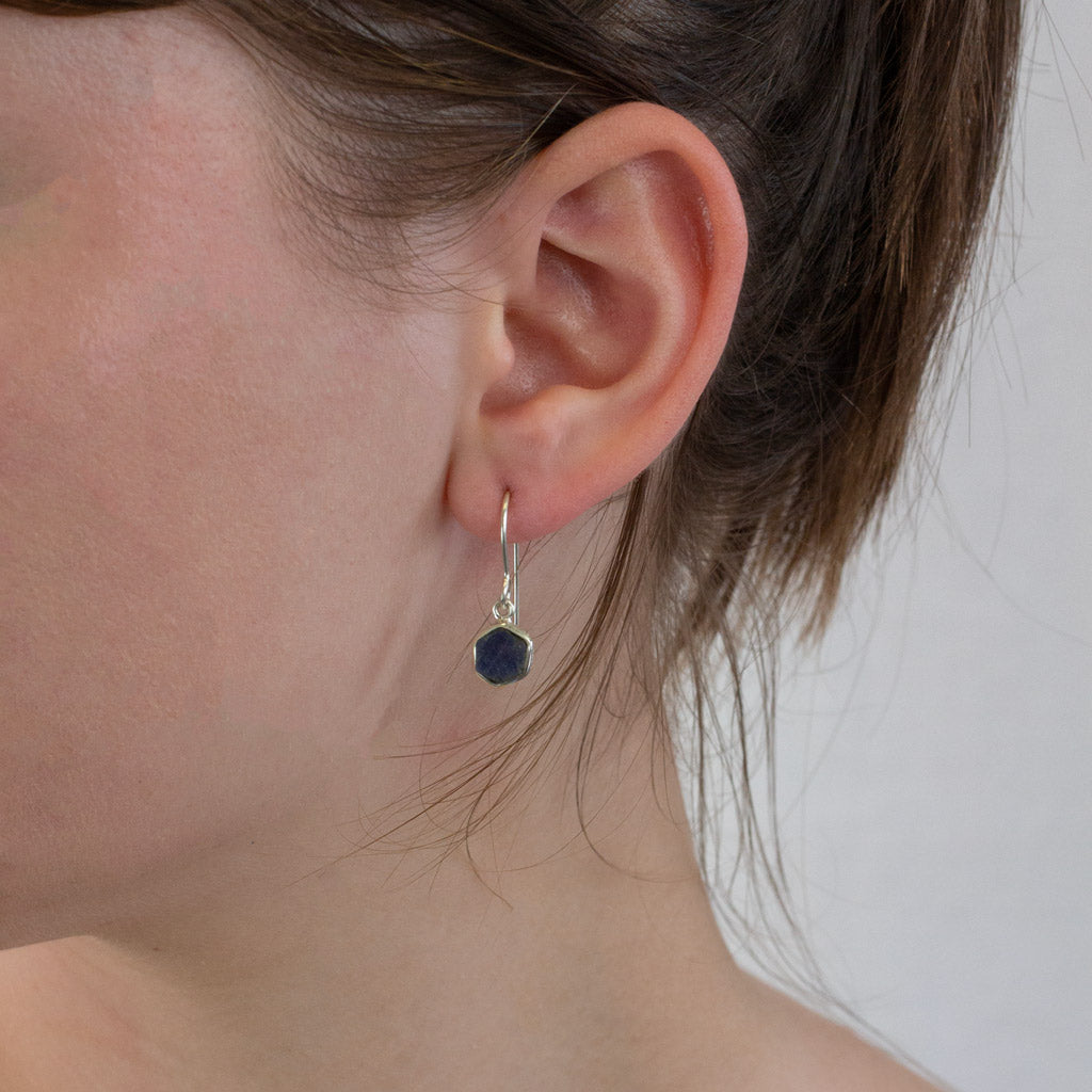 Sapphire drop earrings on model
