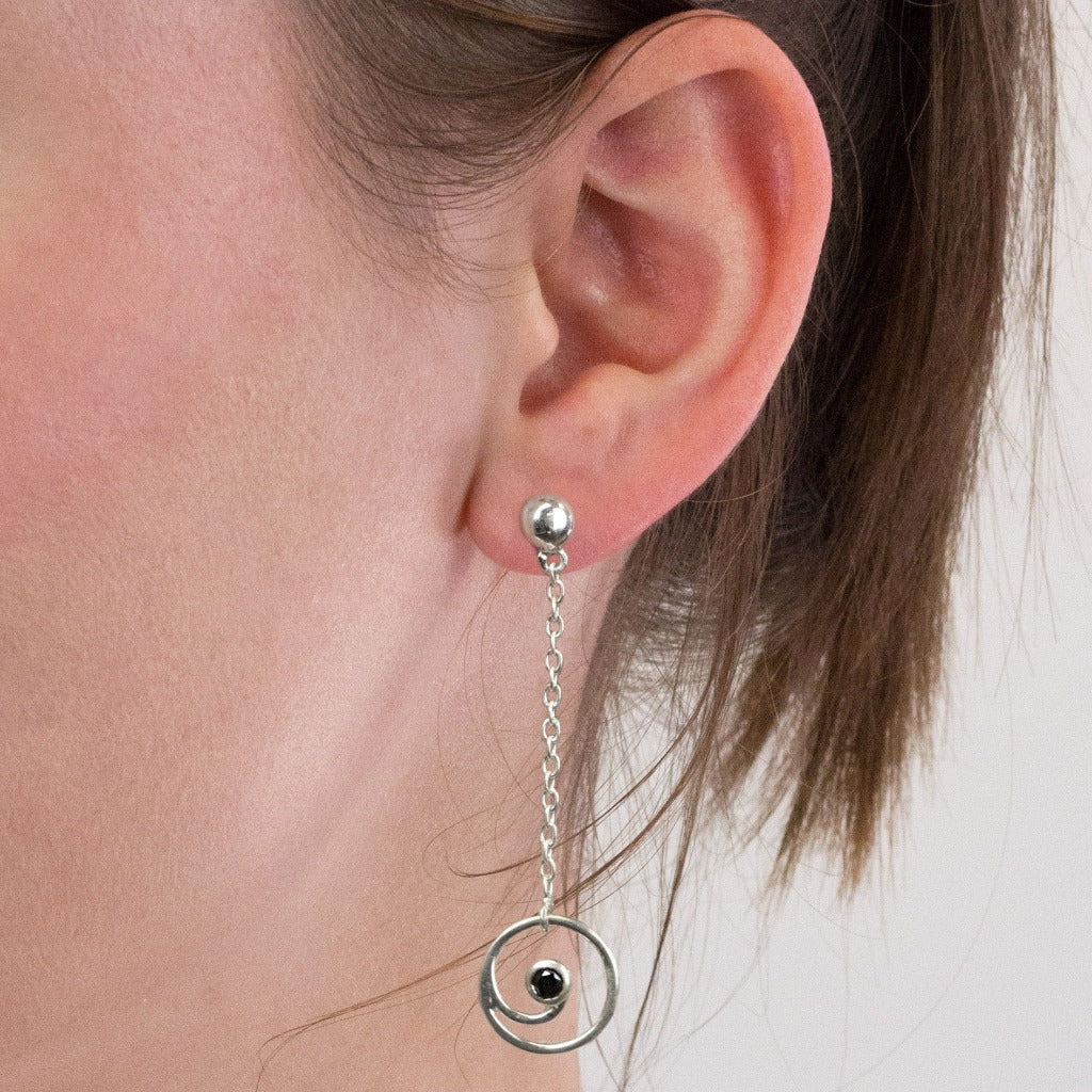 Onyx stud drop earrings on model