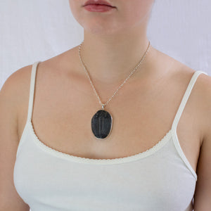 Trilobite necklace on model