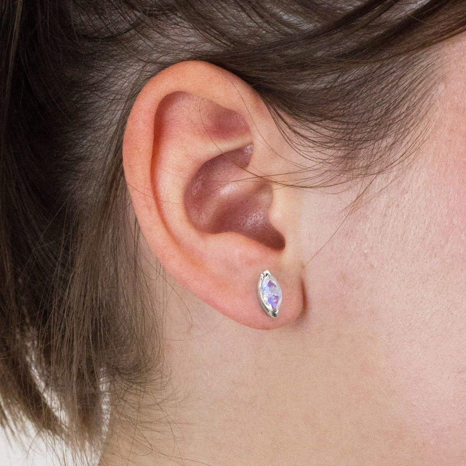 Rainbow Moonstone stud earrings on model