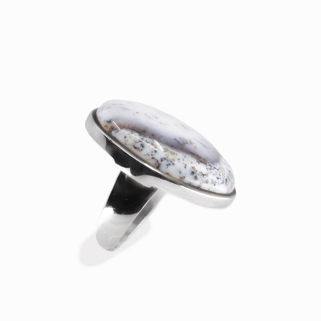 Dendritic Opal round cabochon ring in polished sterling silver with milky white tones and delicate natural branch-like dendritic inclusions.