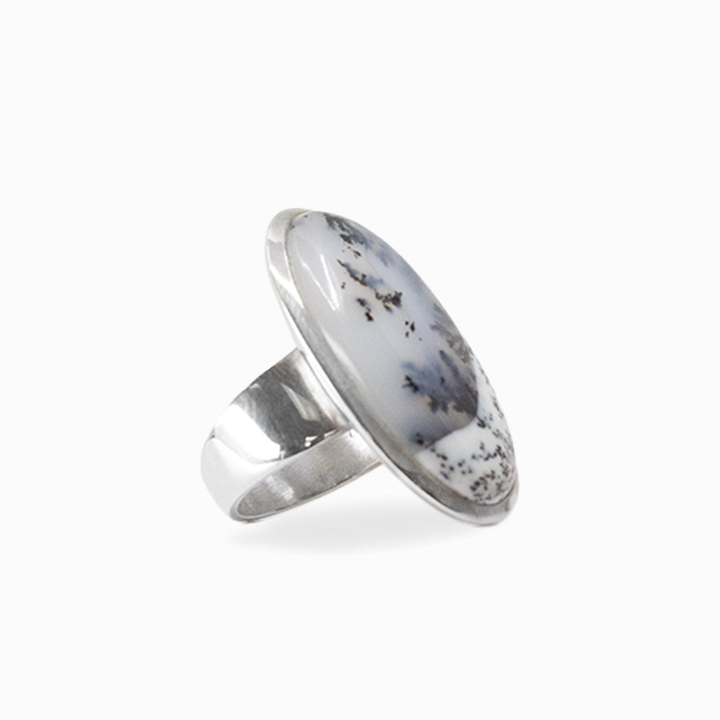 Oval Dendritic Opal cabochon with natural black branching inclusions set in 925 sterling silver.