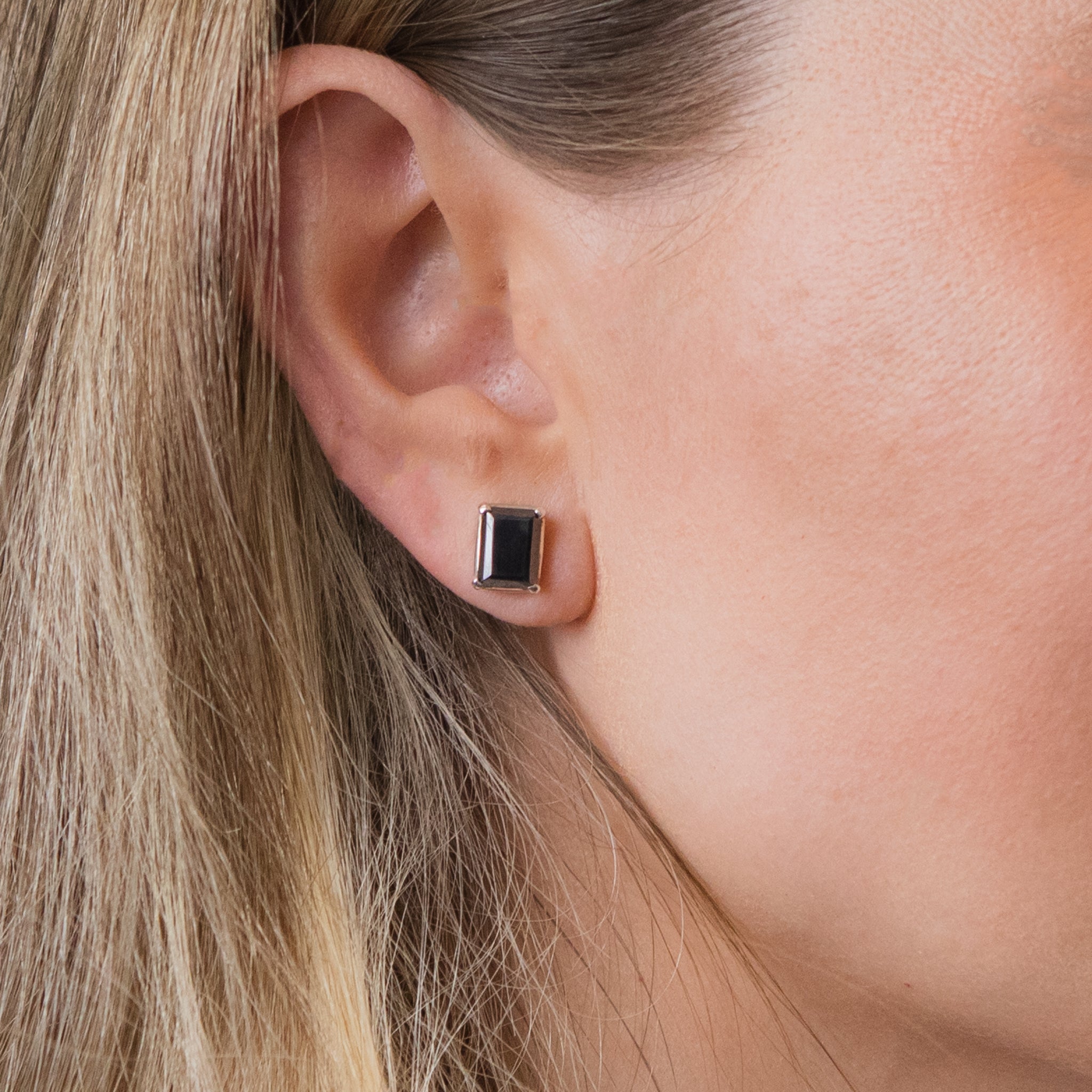 faceted rectangular hematite stud earrings ON MODEL