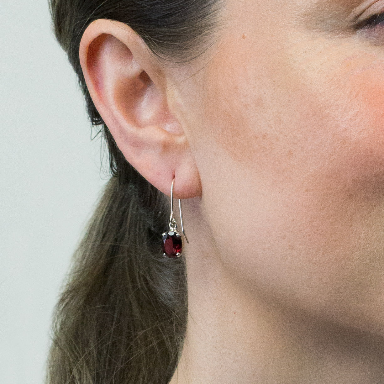 GARNET FACETED DROP EARRINGS ON MODEL