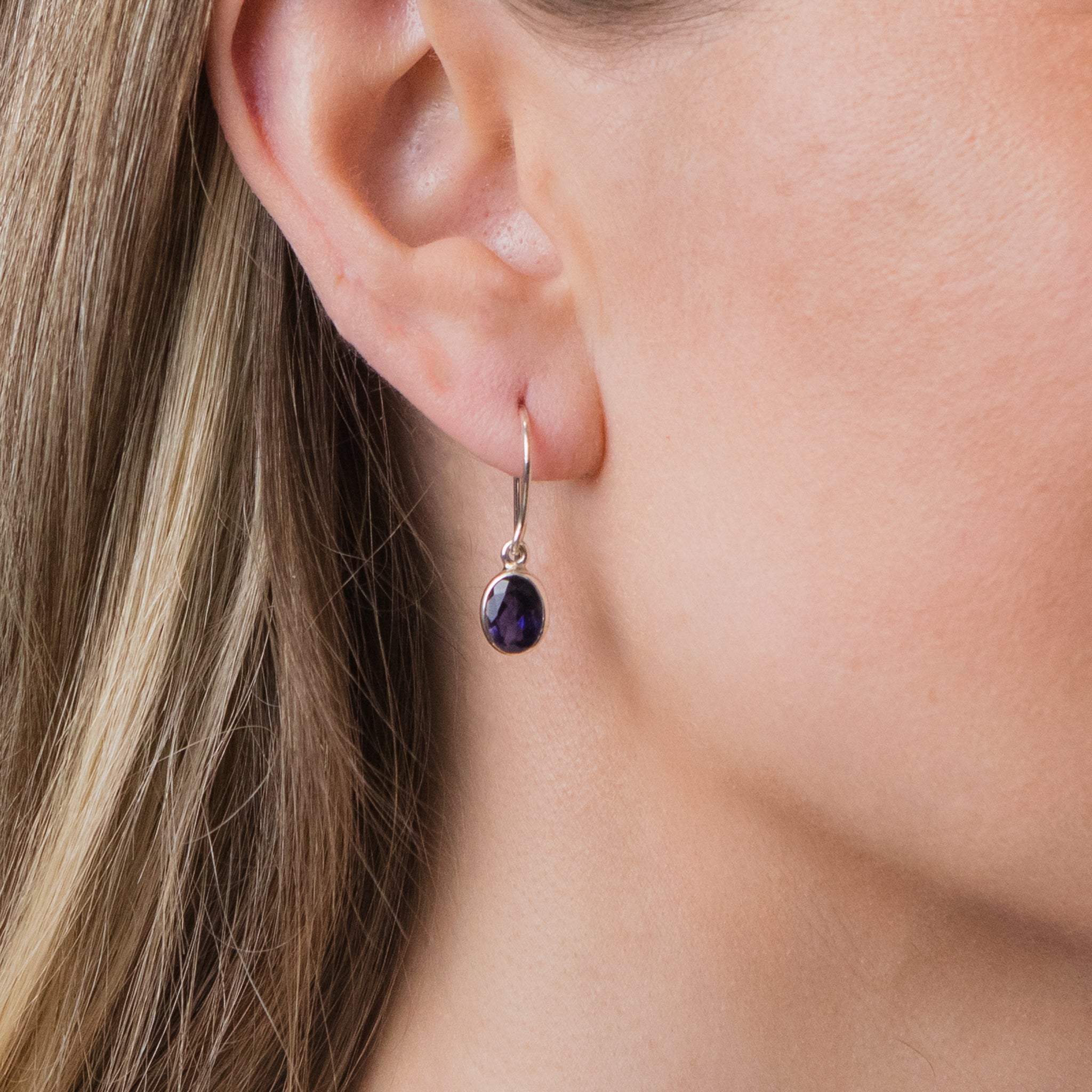 FACETED IOLITE DROP EARRINGS ON MODEL