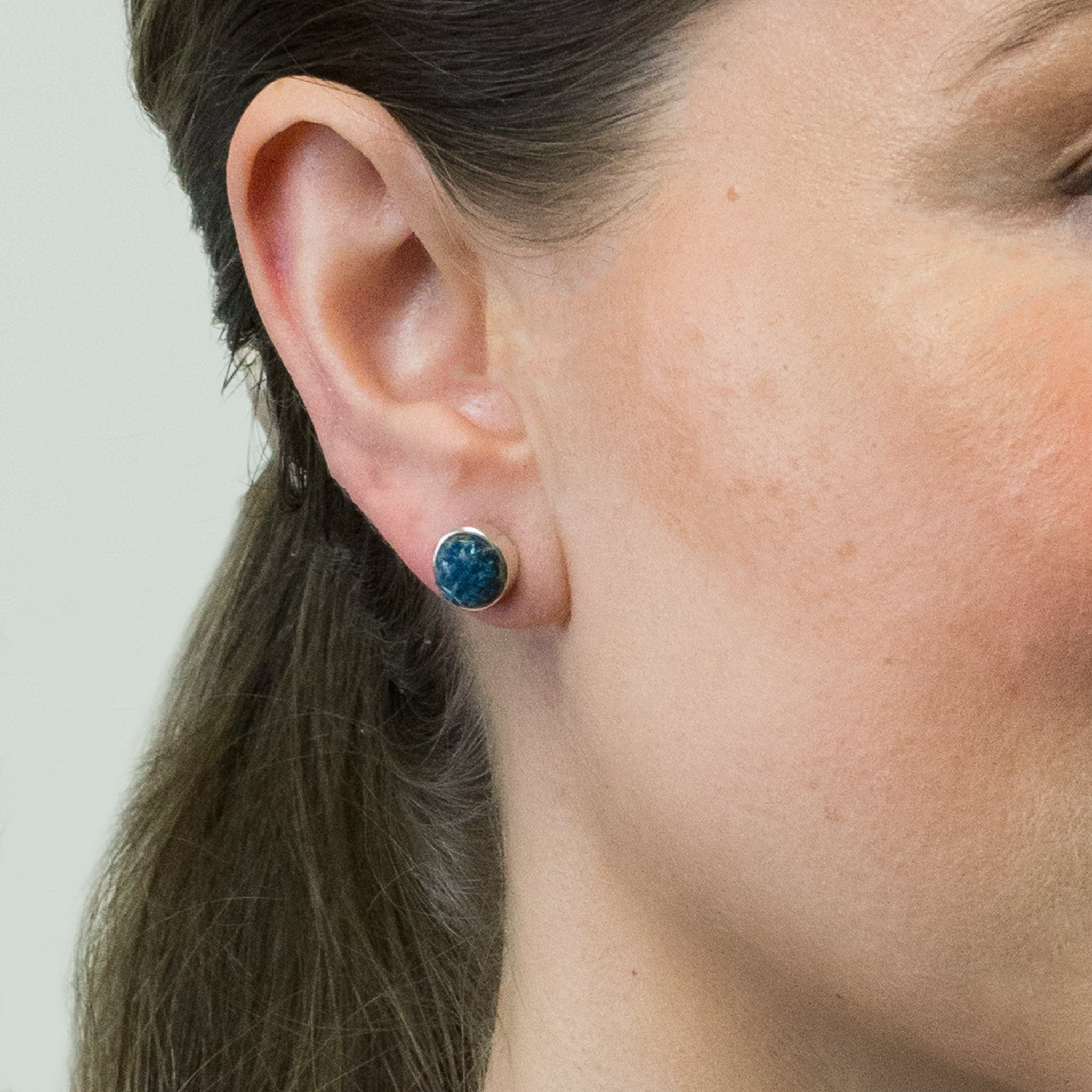 CAVENSITE STUD EARRINGS ON MODEL