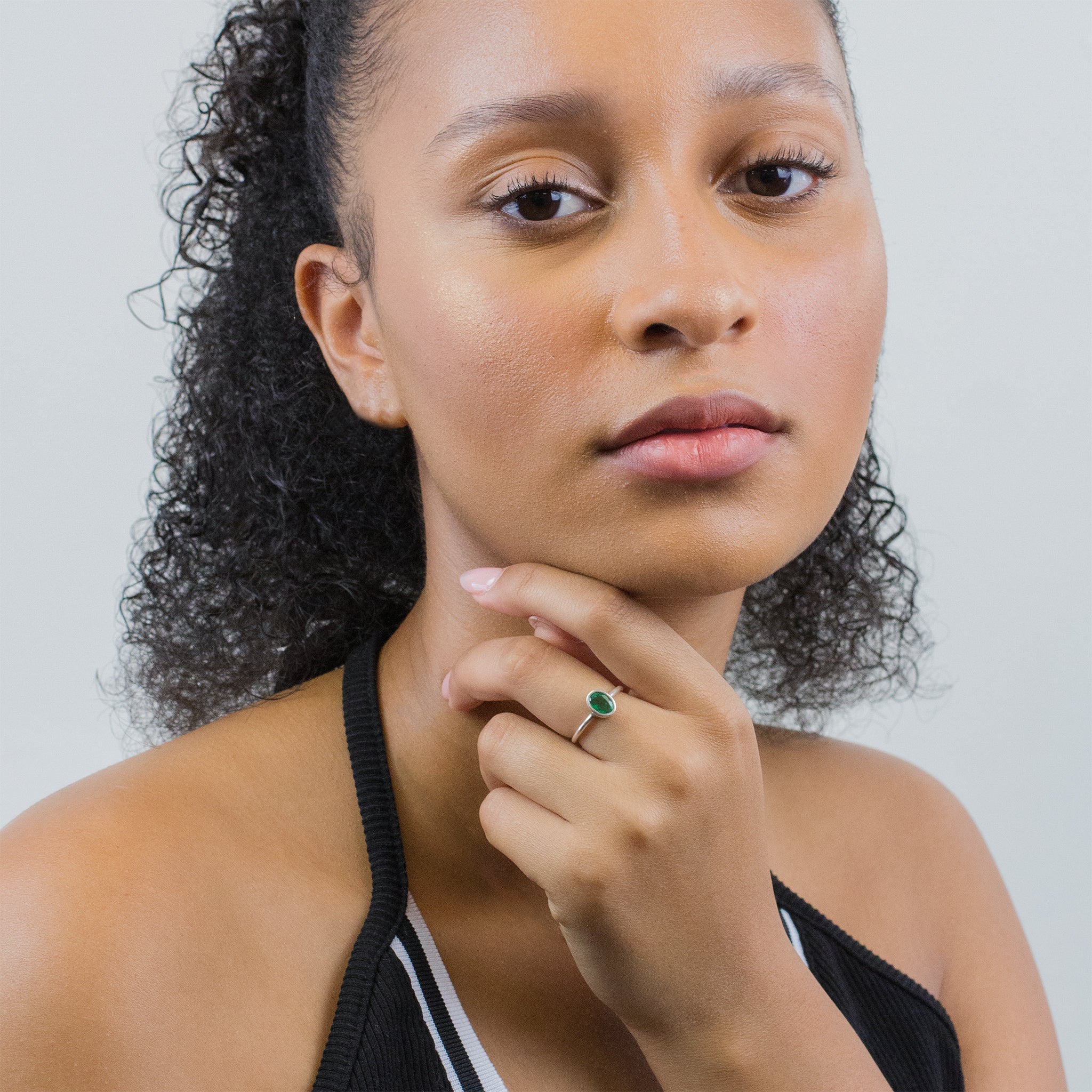 EMERALD RING ON MODEL