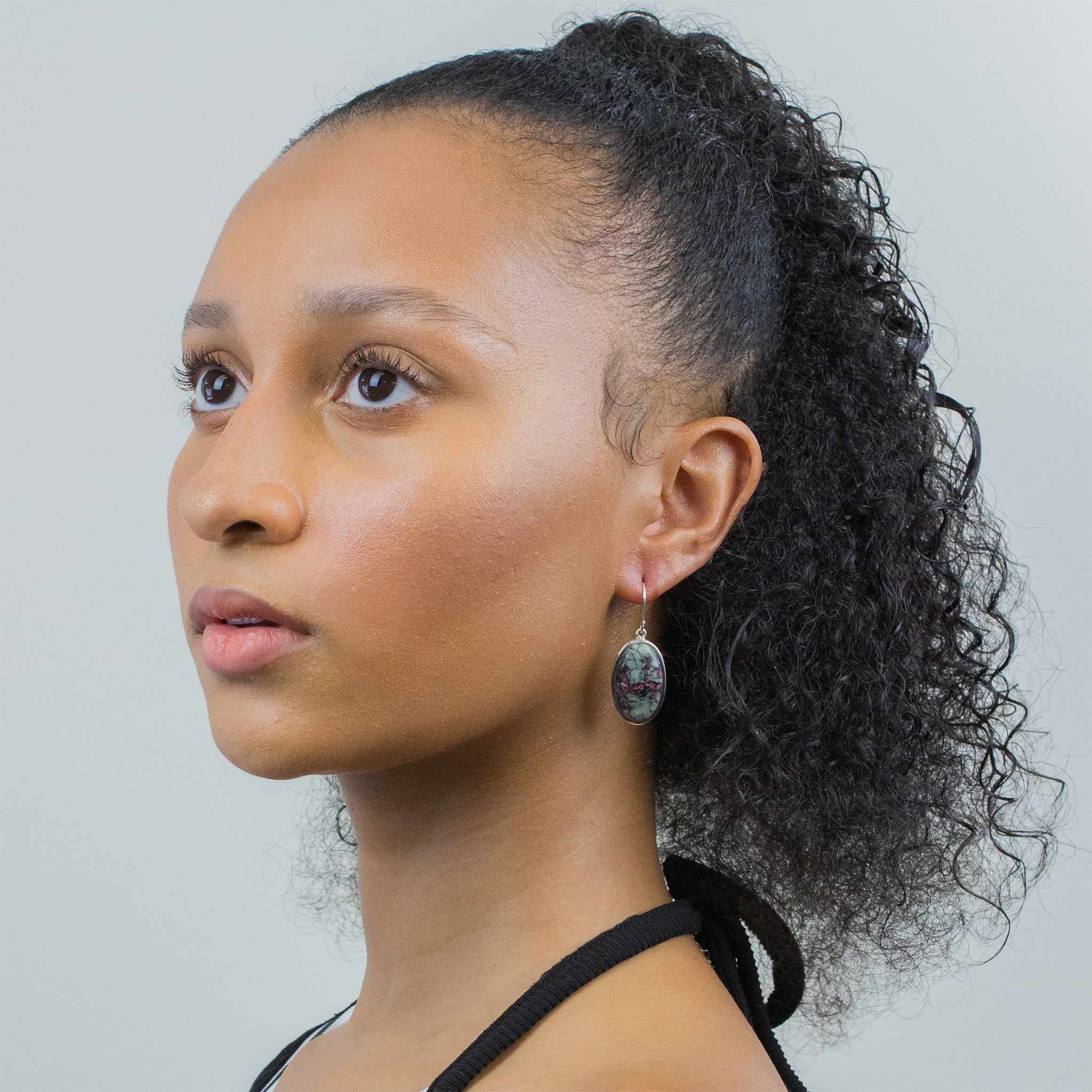 EUDIALYTE EARRINGS ON MODEL