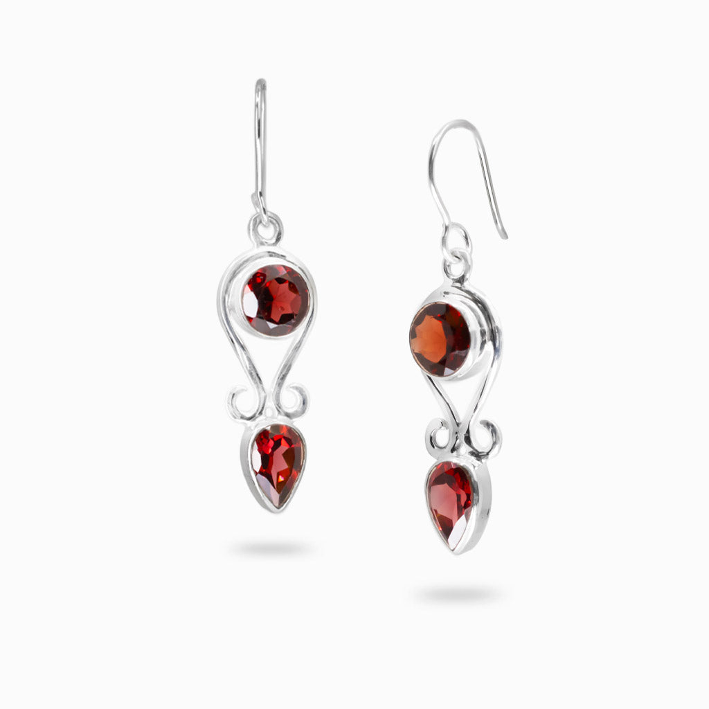 Sterling silver drop earrings featuring faceted round and pear-shaped Garnet gemstones.