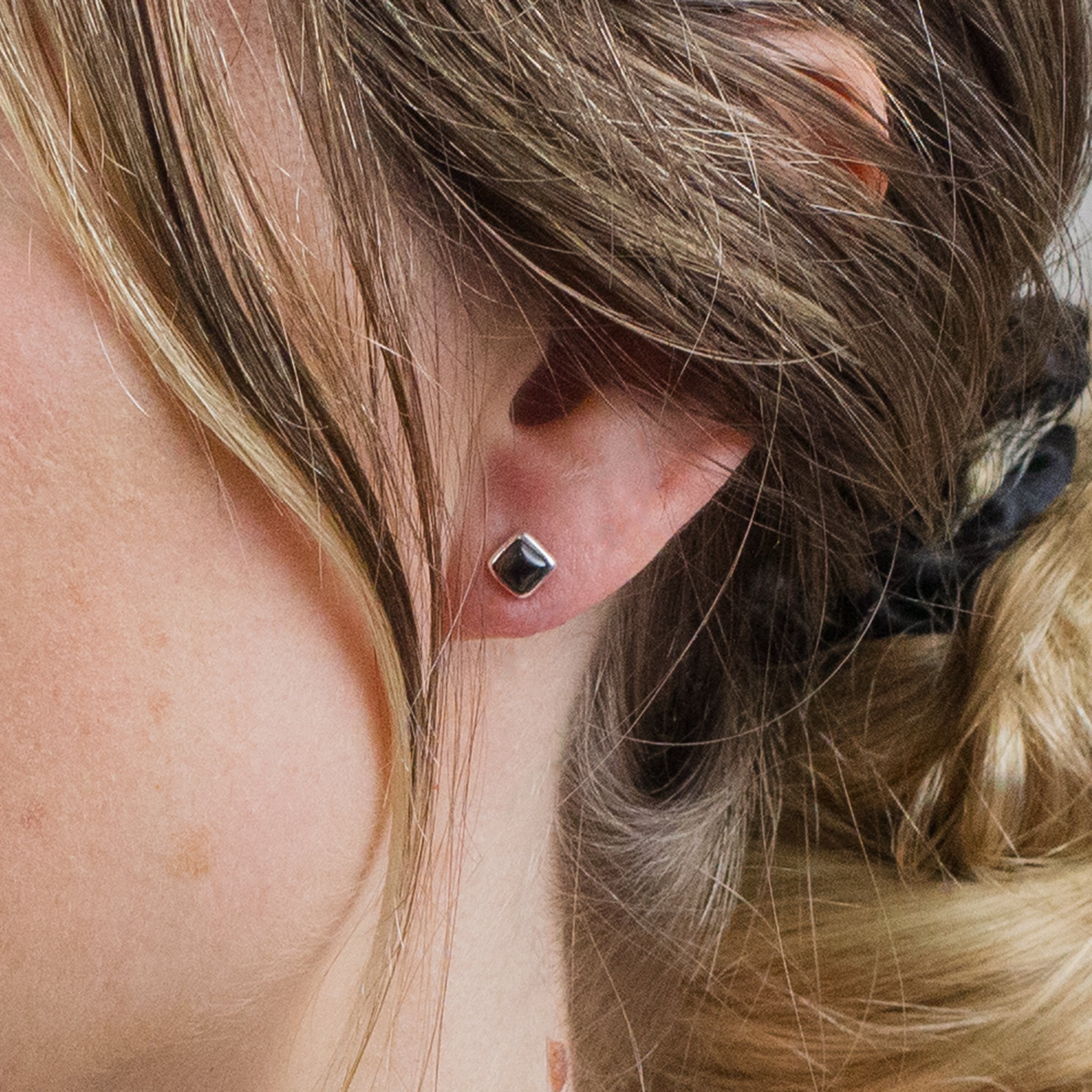 HEMATITE CABOCHON STUDS ON MODEL