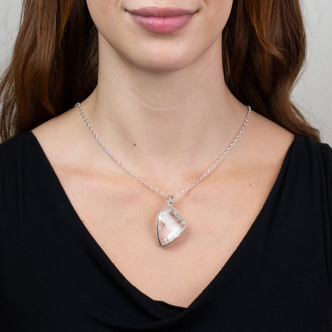 Natural Manifestation Quartz pendant necklace in sterling silver featuring clear quartz with unique internal crystal formations.