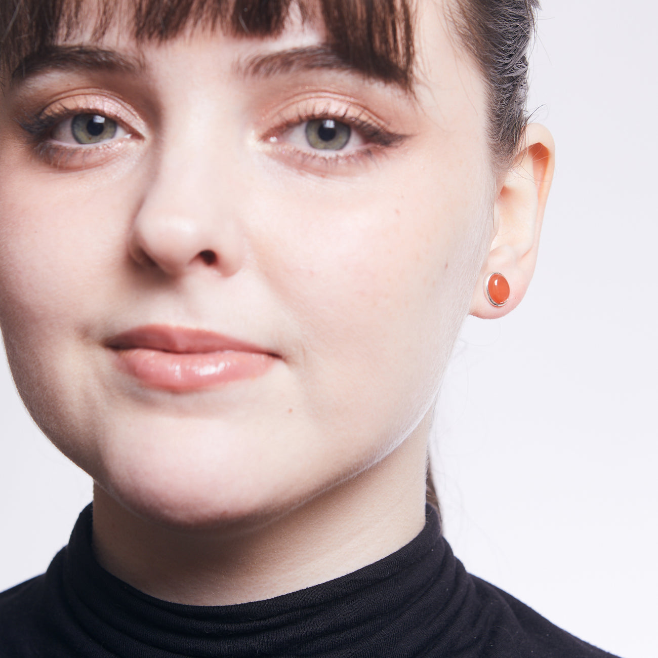 CABOCHON CARNELIAN STUD EARRINGS ON MODEL | MADE IN EARTH