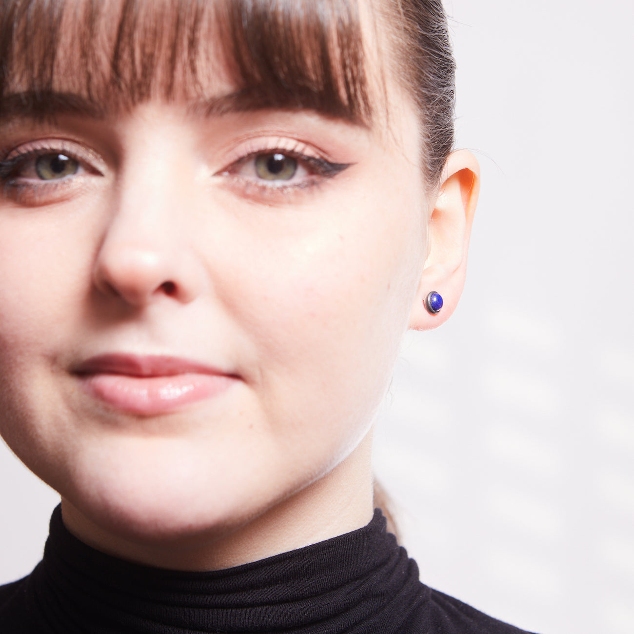 ROUND CABOCHON LAPIS LAZULI STUD EARRINGS STERLING SILVER ON MODEL| MADE IN EARTH