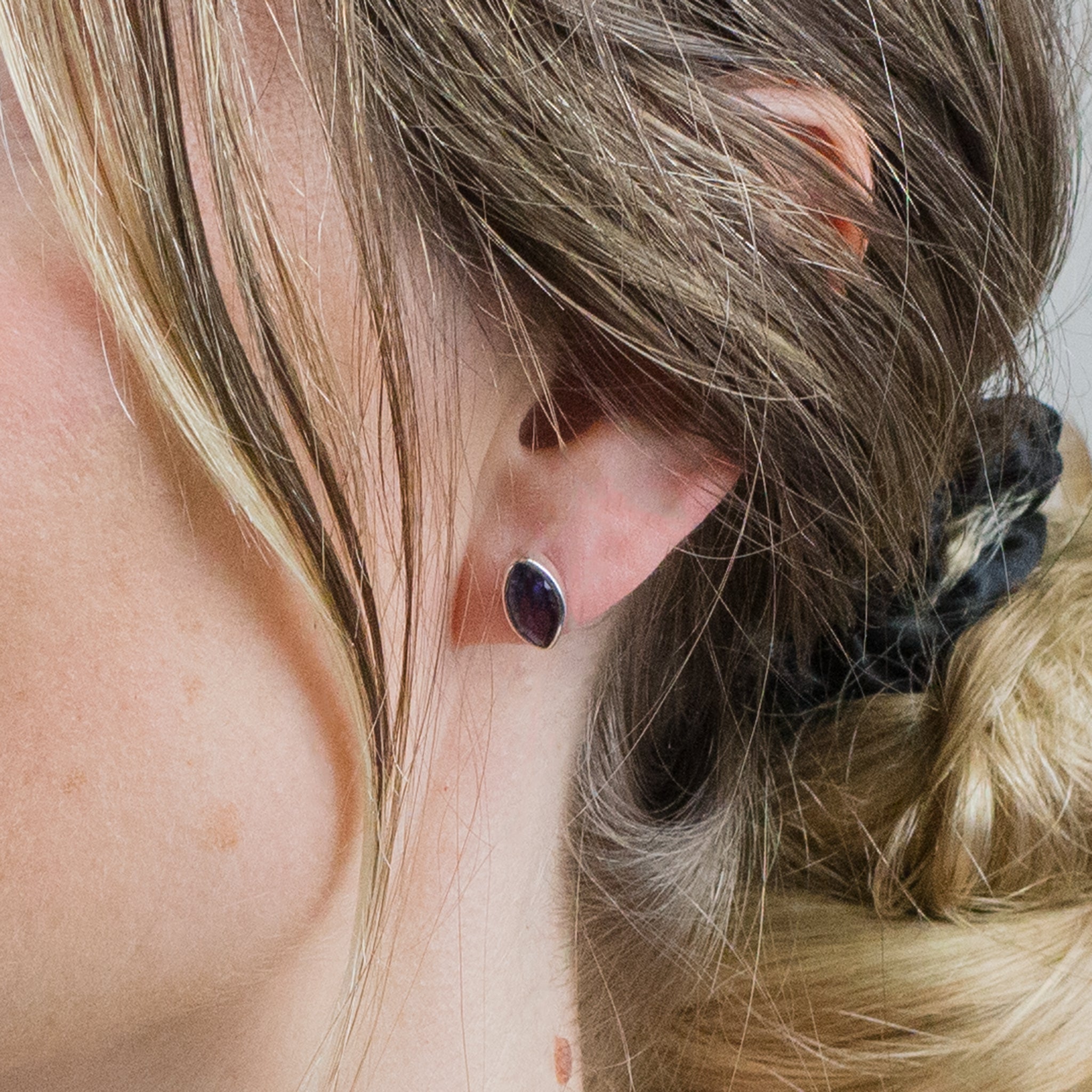 IOLITE STUD EARRINGS ON MODEL